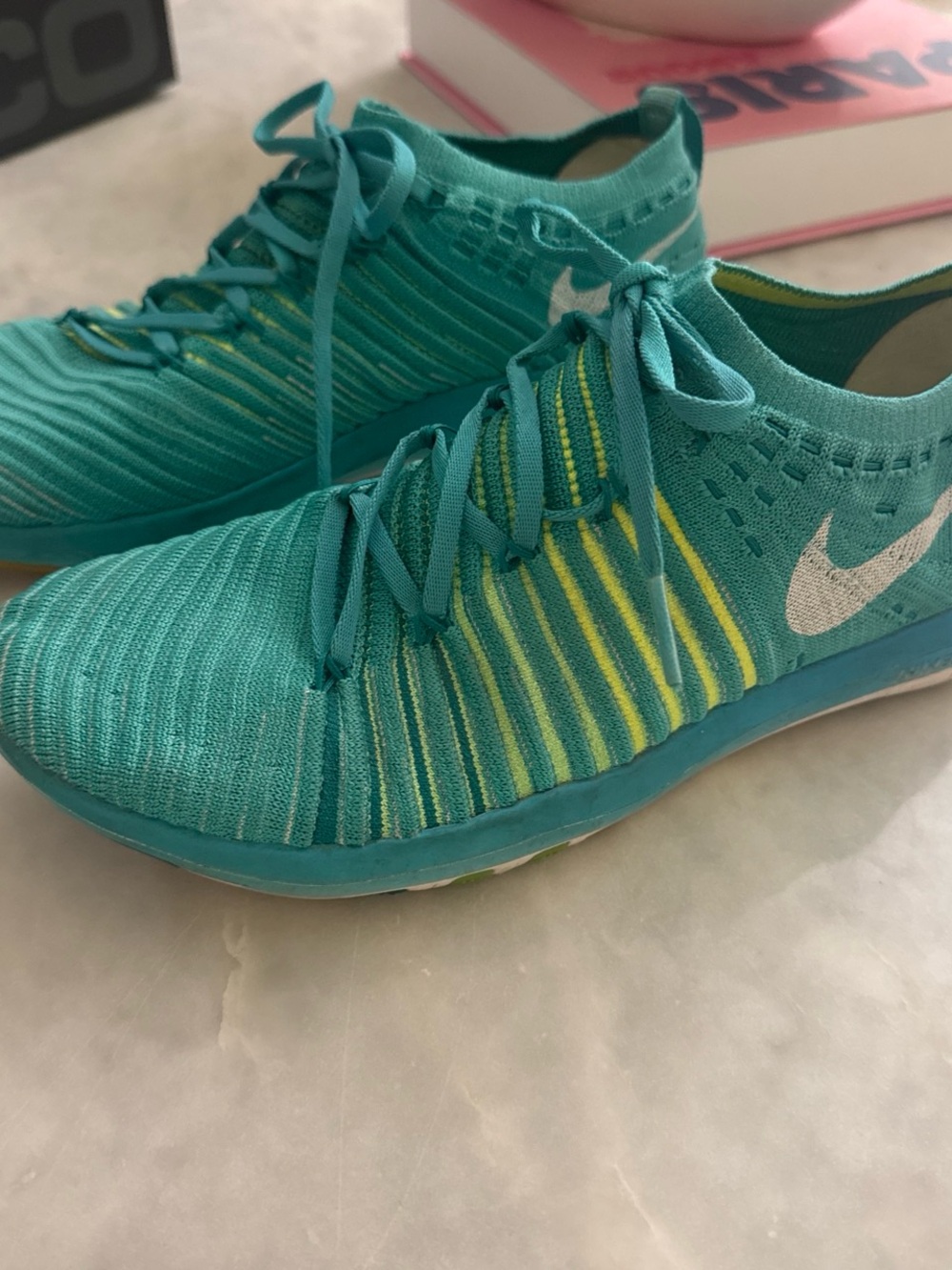 Nike Women’s Teal and Yellow Knit Slip-On Sneakers